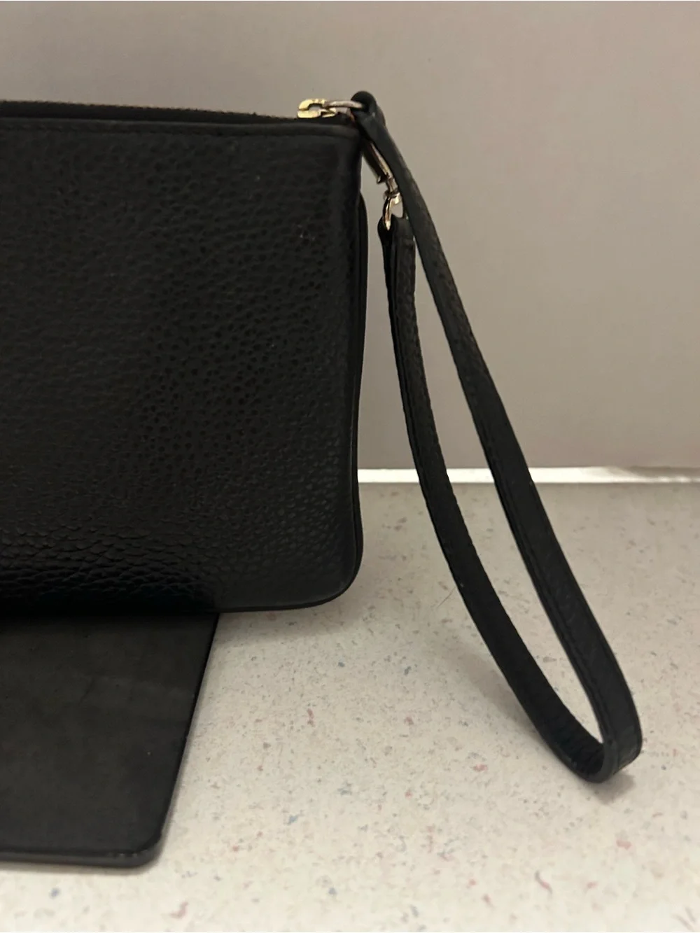 kate spade Black Pebble Leather Wristlet with Tassel